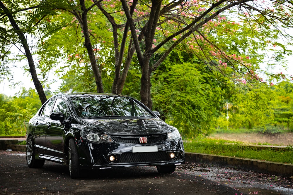 black bmw m 3 parked on dirt road