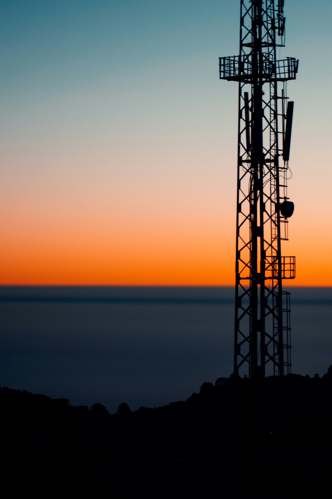 silhouette of tower during sunset