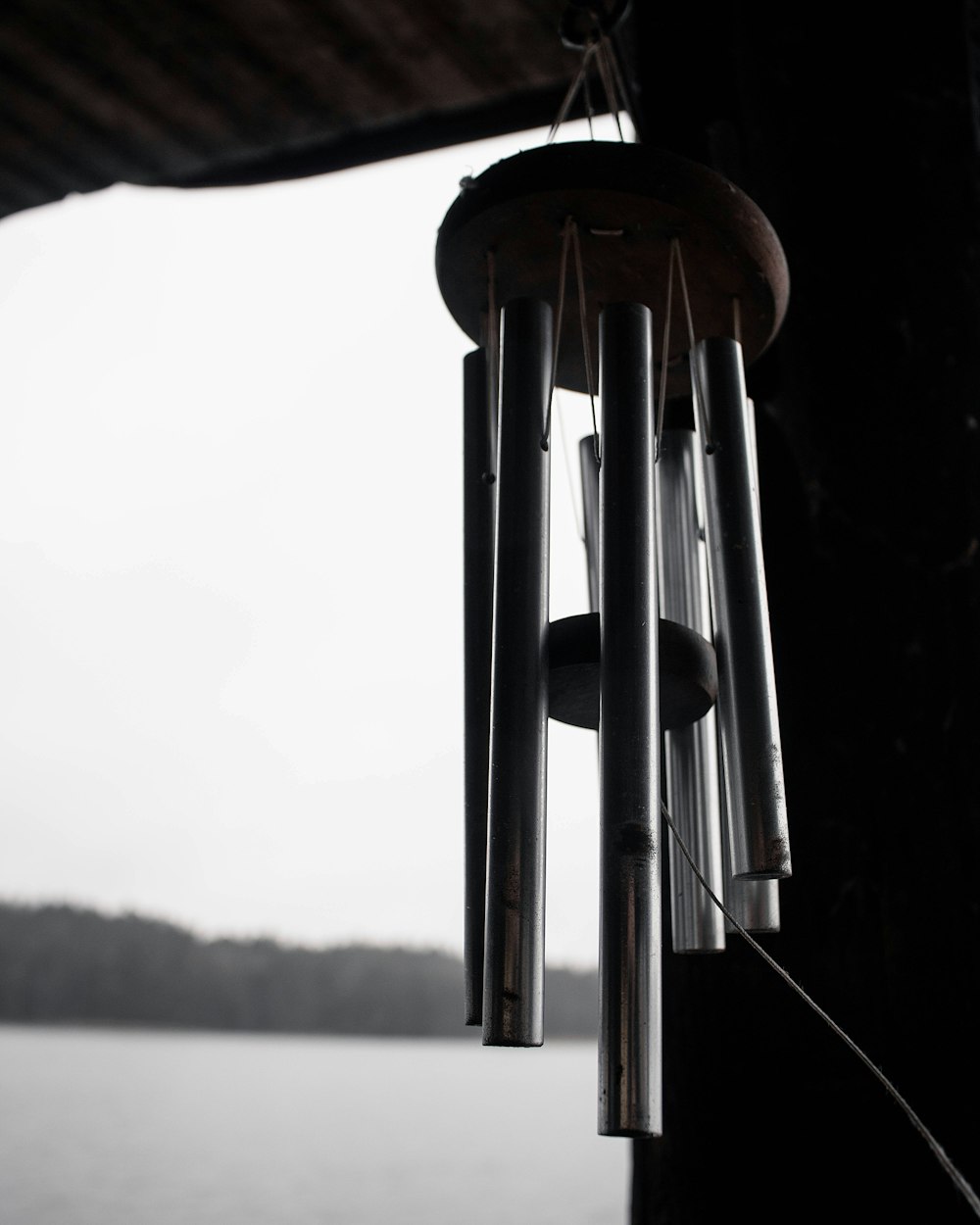 brown wind chime on roof