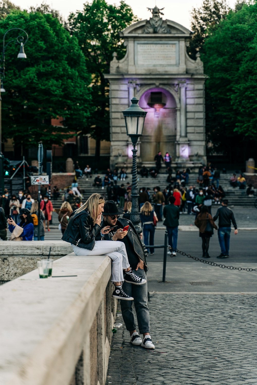 people walking on sidewalk during daytime