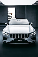 white bmw m 3 coupe parked in garage