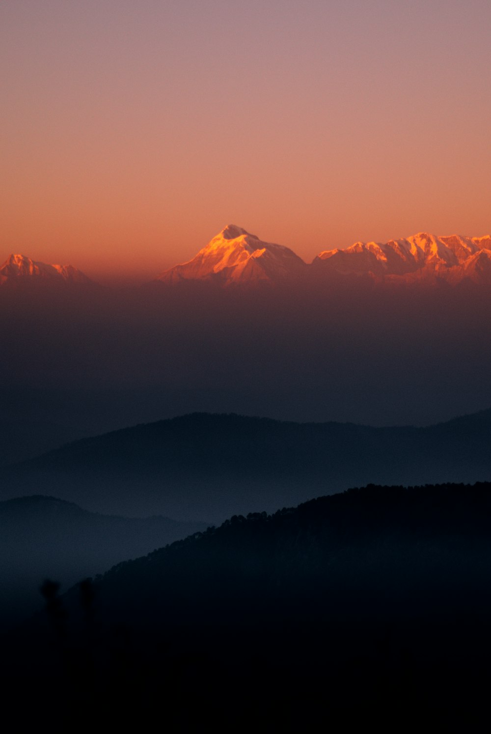 silhouette of mountains during sunset