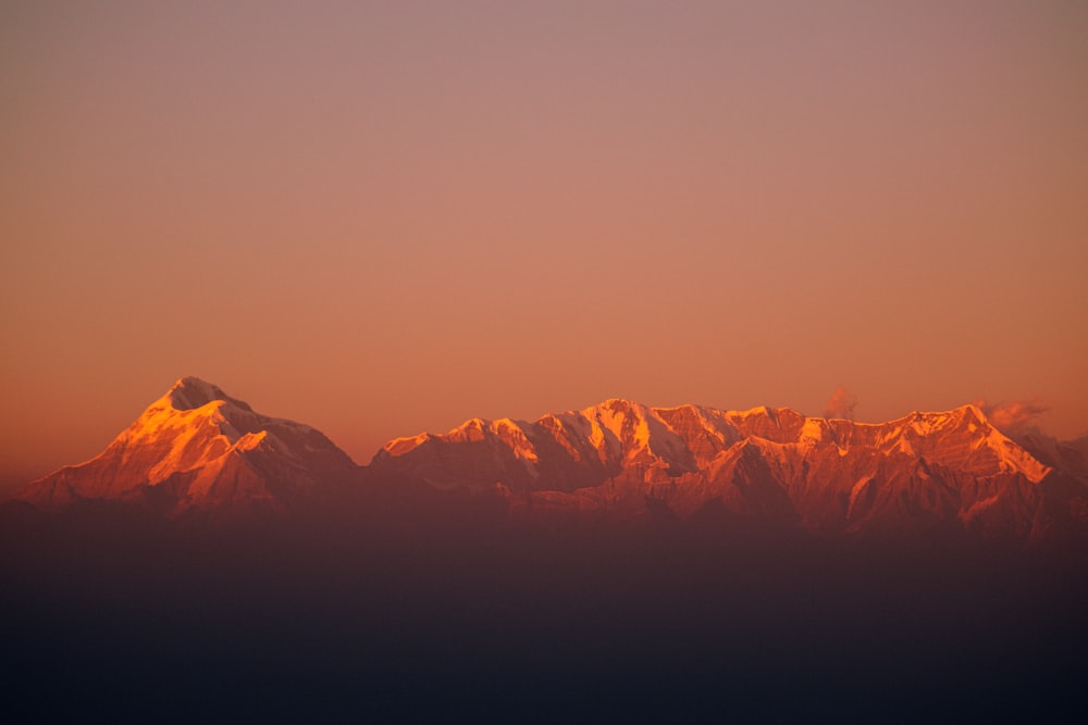 silhouette of mountains during sunset