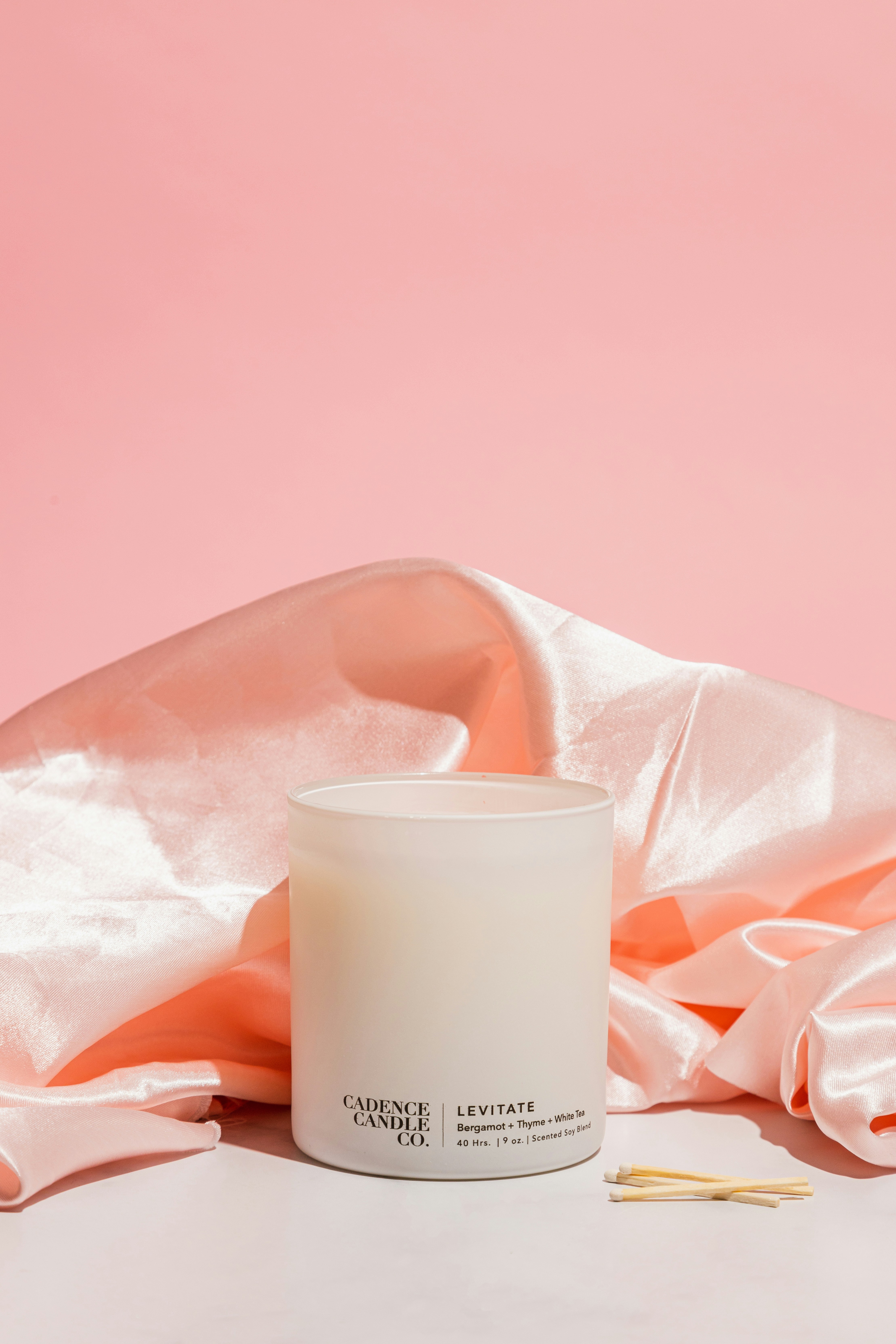 Olive drab green insulated bottle with flared screw lid and flat top.