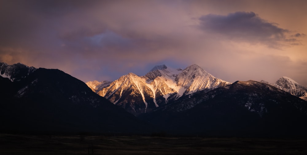 snow covered mountains during daytime