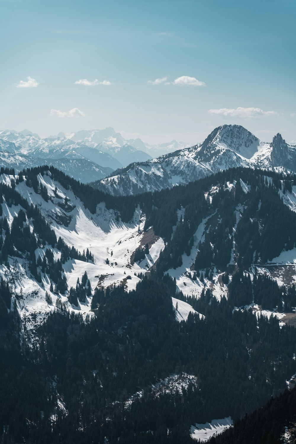 snow covered mountain during daytime