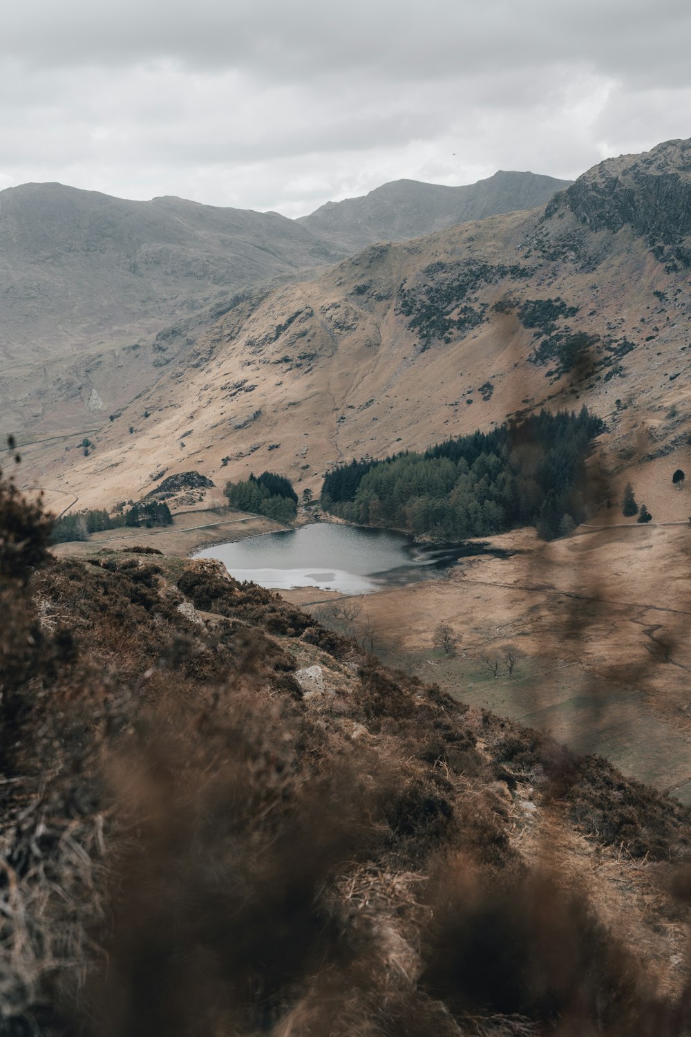 lake in the middle of mountains