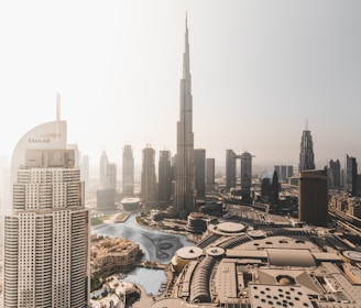 high rise buildings near body of water during daytime