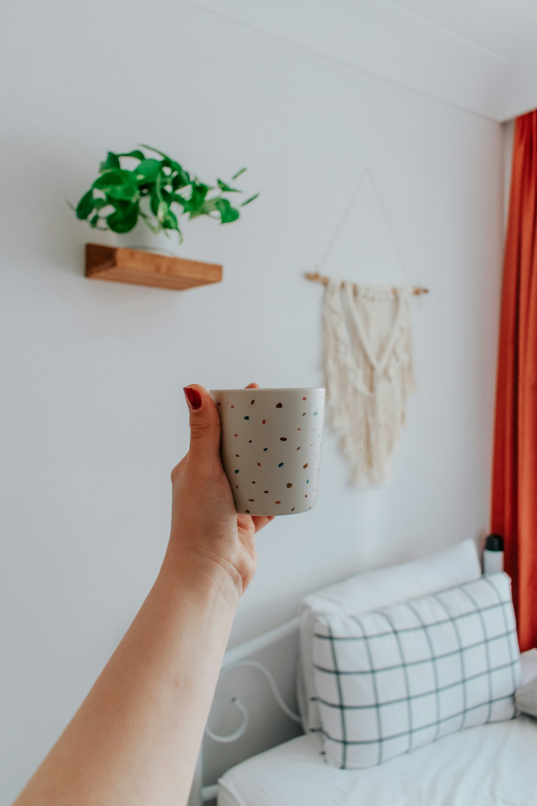 white and black polka dot ceramic mug