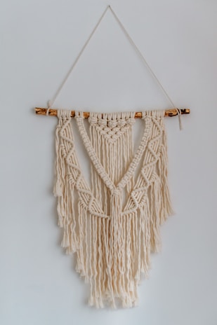 brown rope on white wall