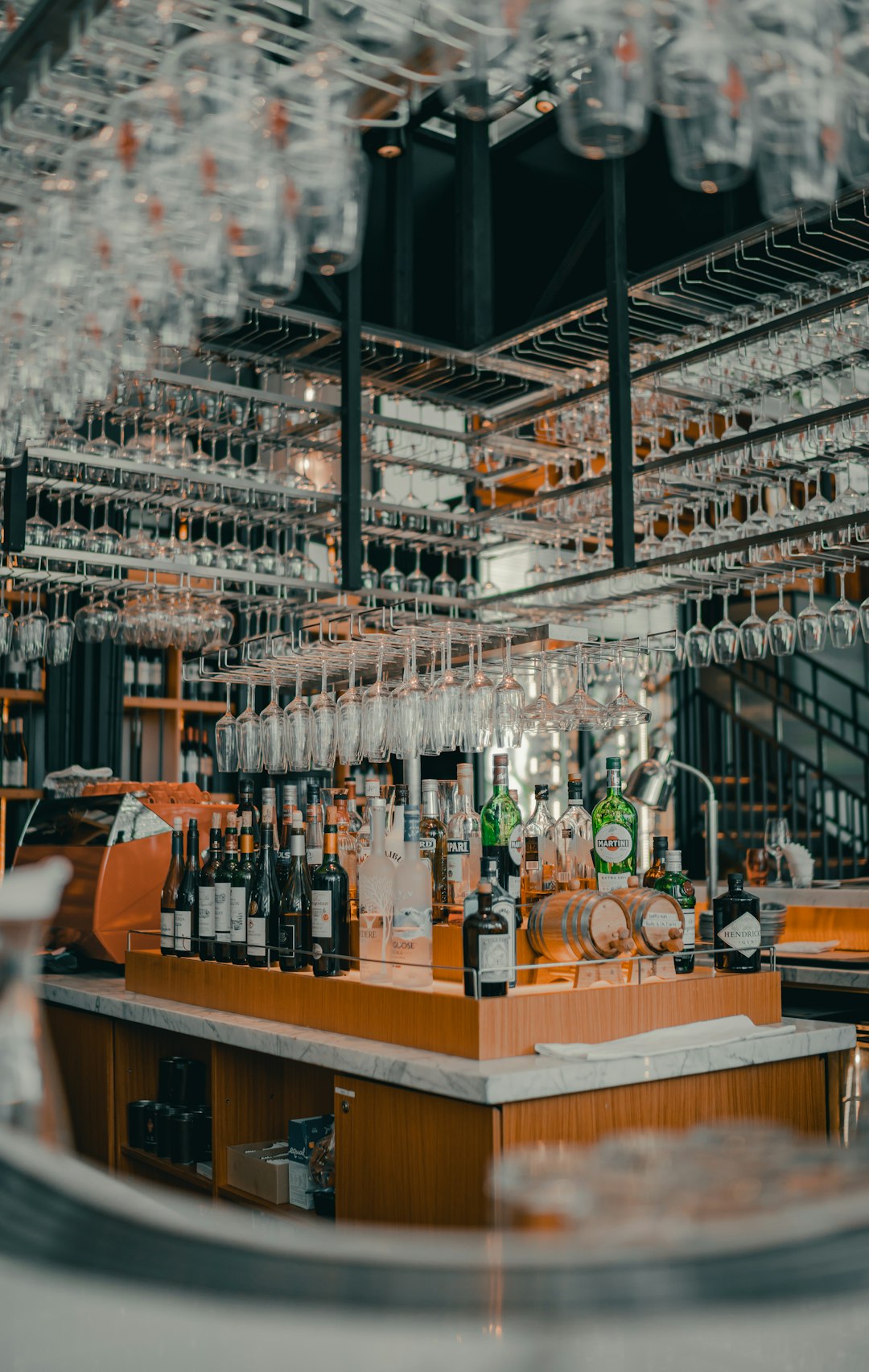 brown wooden table with bottles and mugs