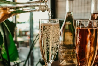 clear wine glass with brown liquid