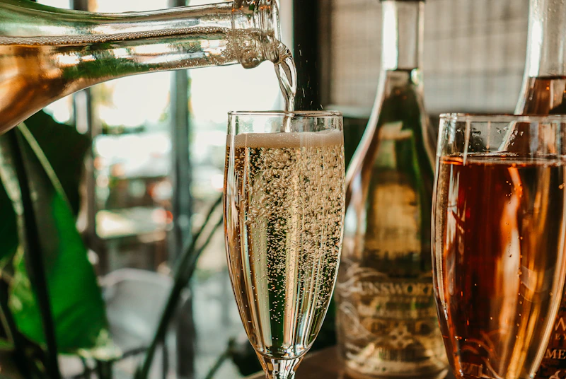 A glass of sparkling wine with bubbles