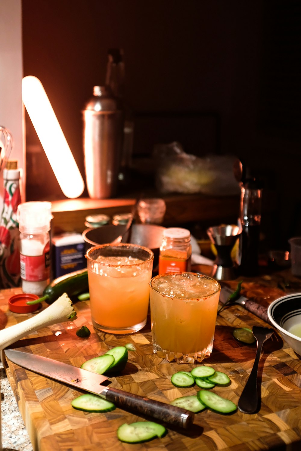 clear drinking glass with orange liquid