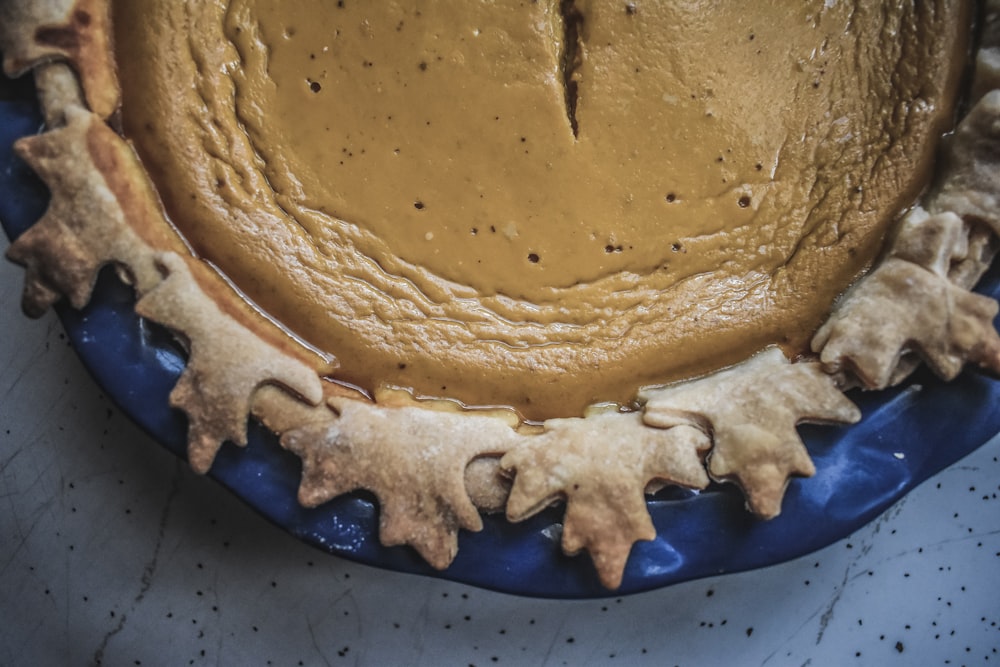 brown cake on blue ceramic plate