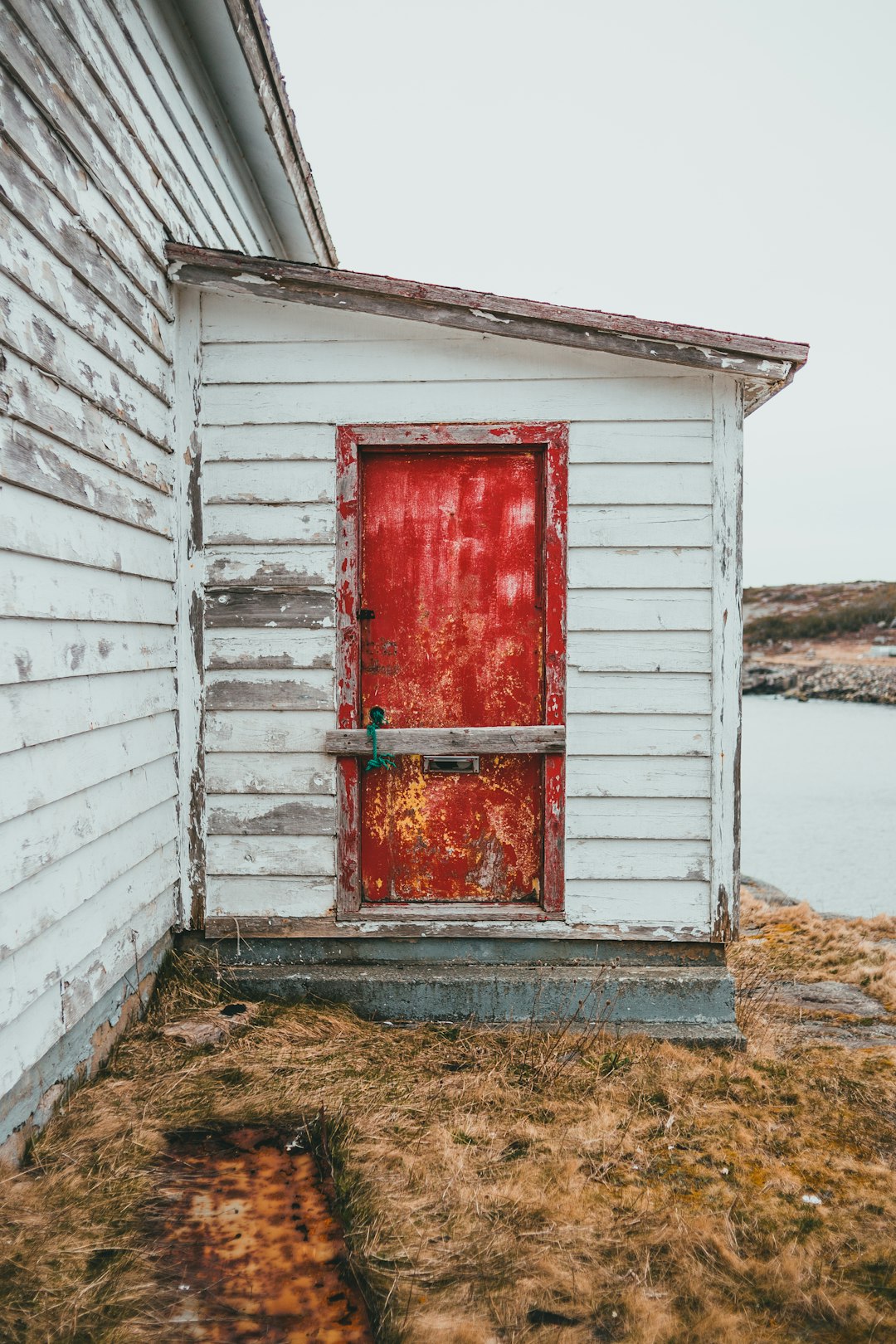 red and white wooden door