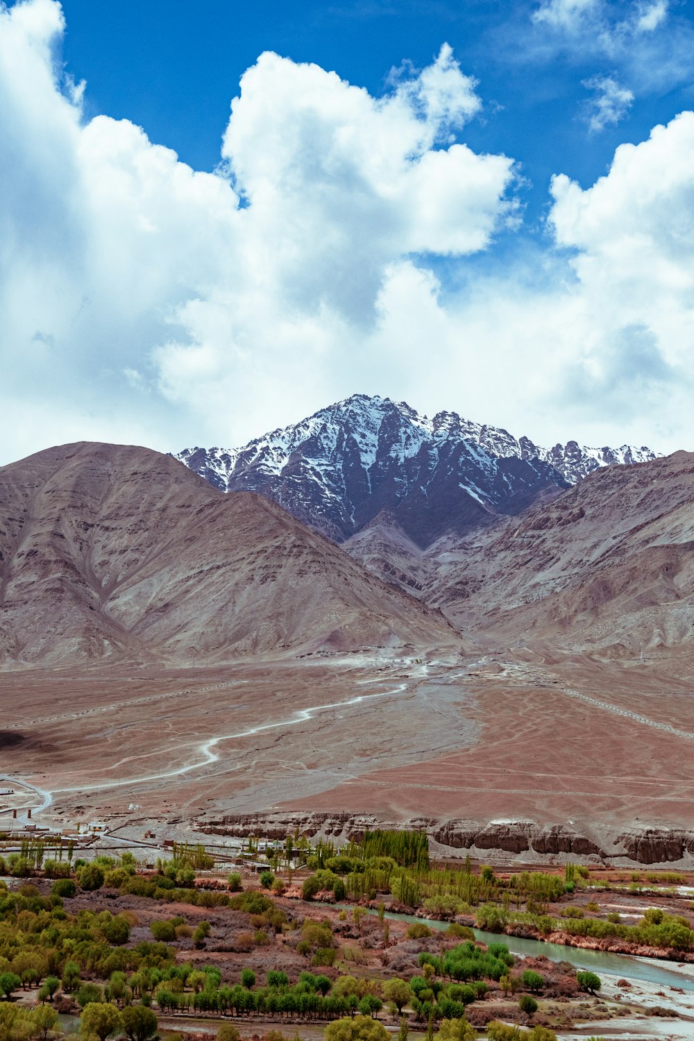 brown and gray mountains under blue sky during daytime