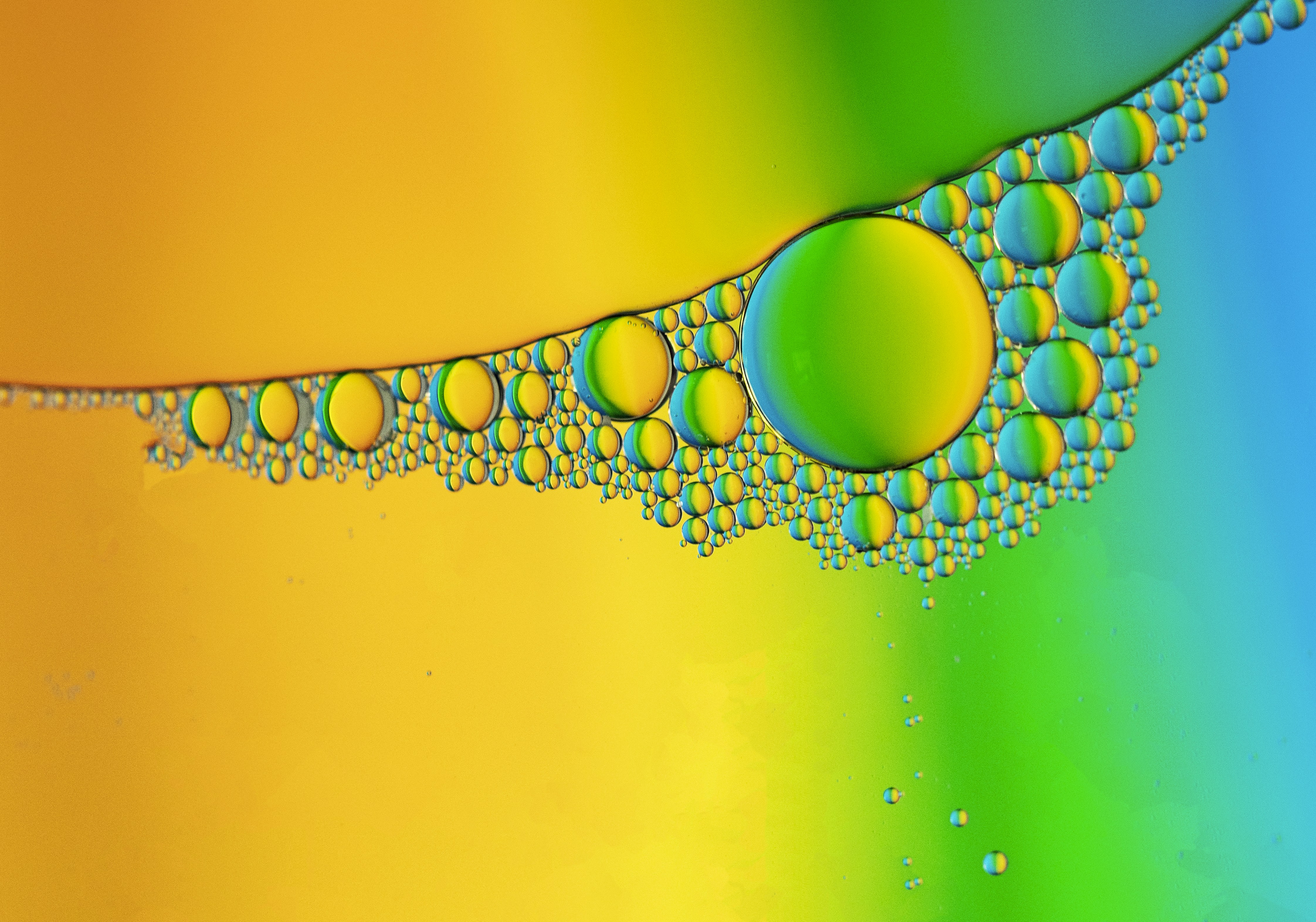 water droplets on yellow surface