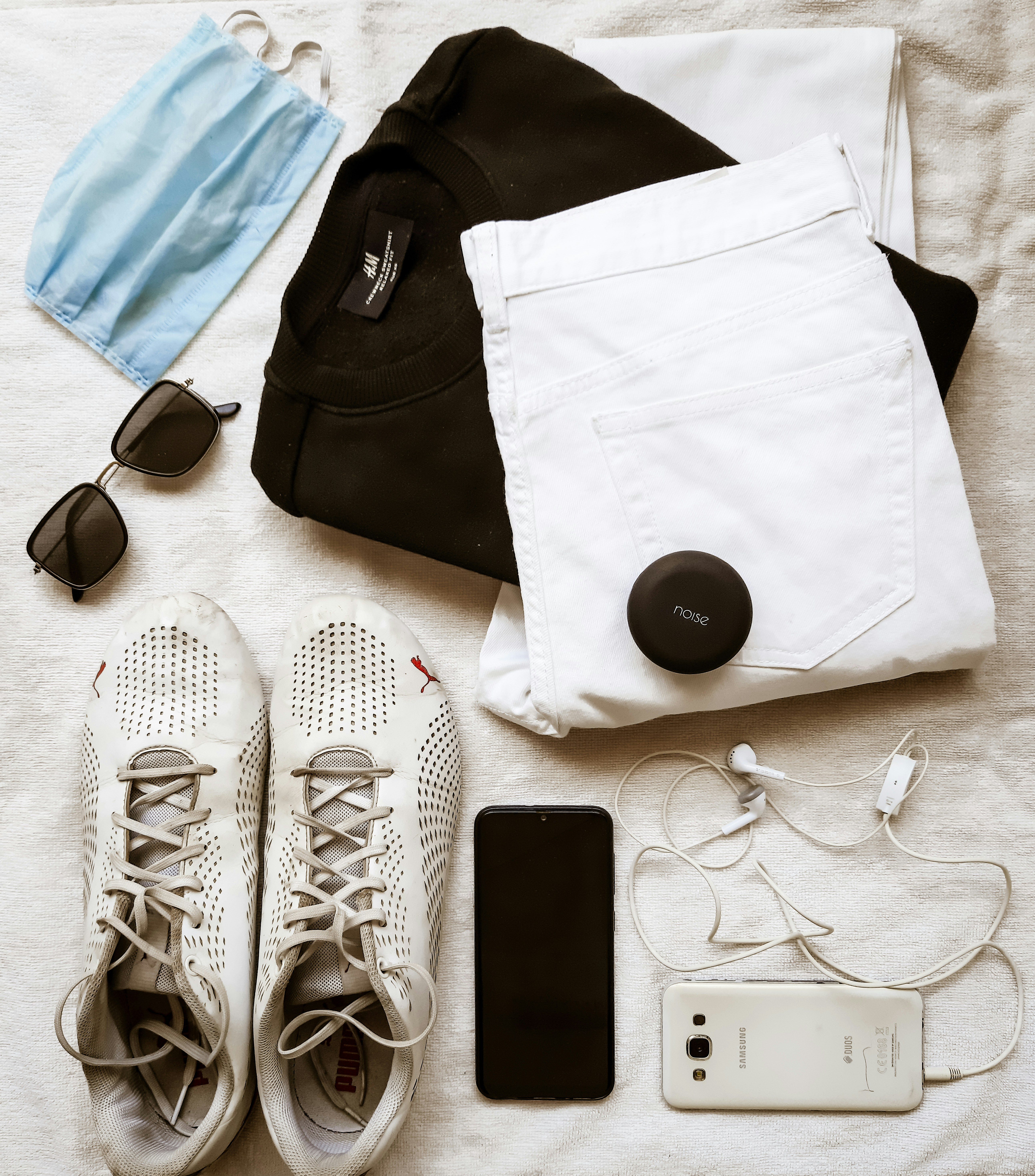 Fashion model wearing chic casual outfit with accessories