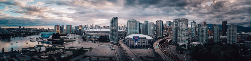 city buildings under gray cloudy sky during daytime