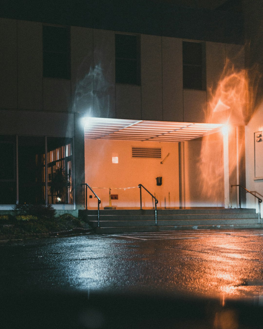 brown concrete building with fire during night time