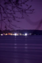 Night view of the flats illuminated softly against the natural backdrop.