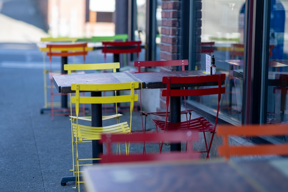 red and yellow wooden chairs