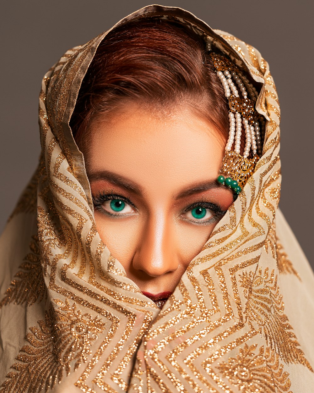 woman in brown and white hijab