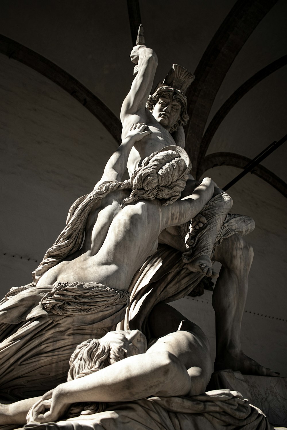 angel statue in grayscale photography