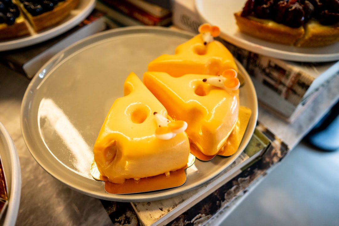 yellow cake on stainless steel tray,