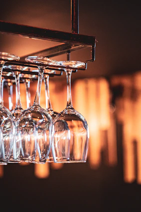 Elegant glassware set shining under warm kitchen lighting