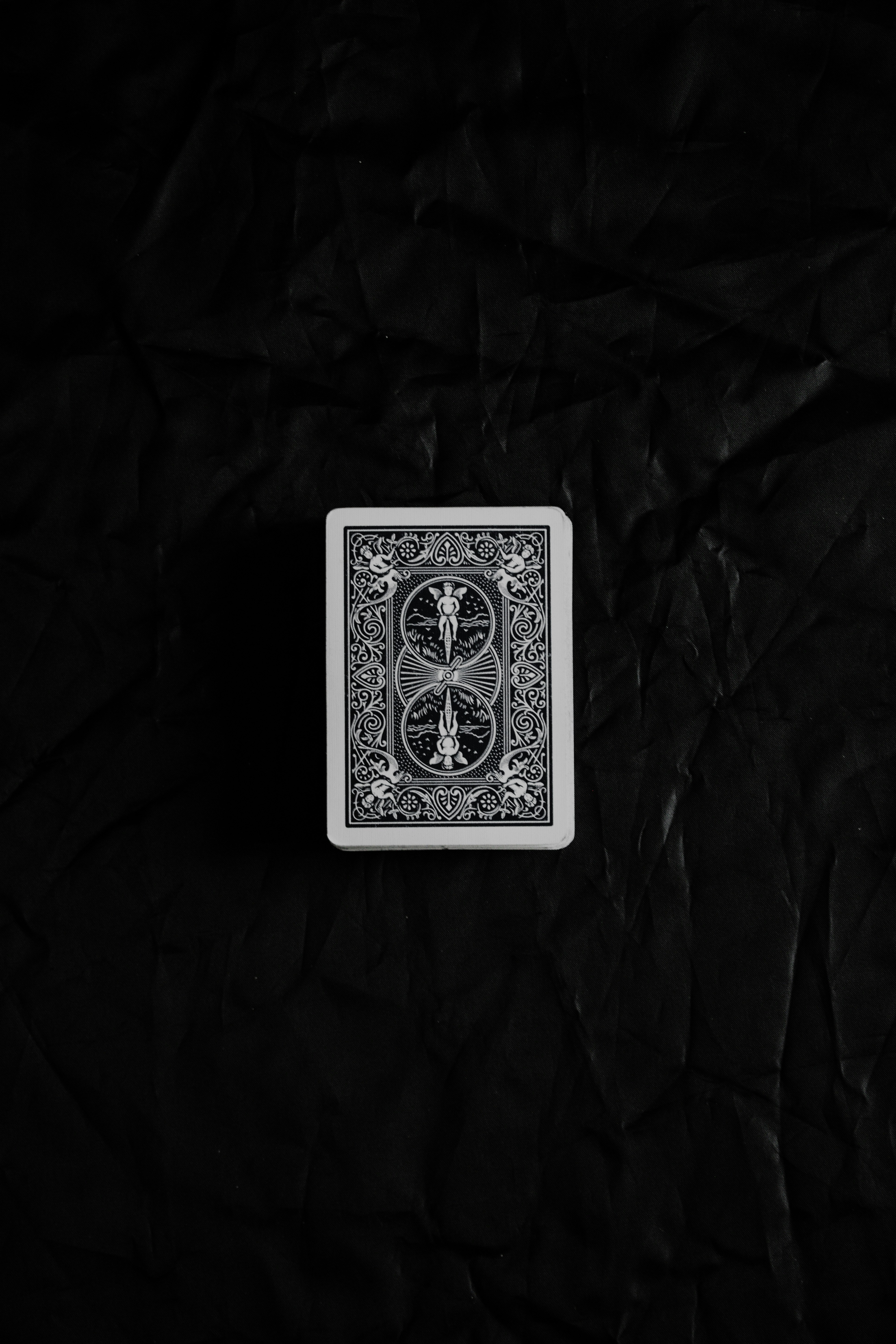 white and blue playing card