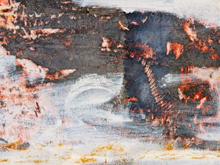 Abstract landscape painting with layered earth tones and subtle brush strokes.