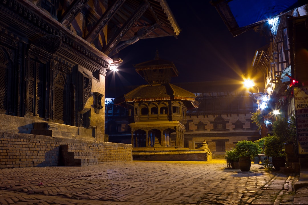 yellow and brown concrete building during night time