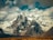 snow covered mountain under cloudy sky during daytime