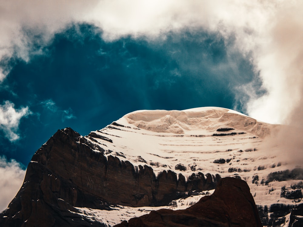 brown rocky mountain under blue sky