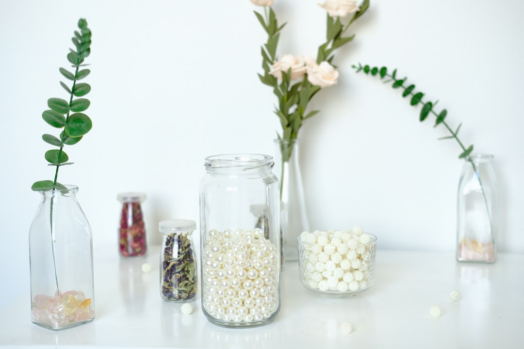 white beads in clear glass jar