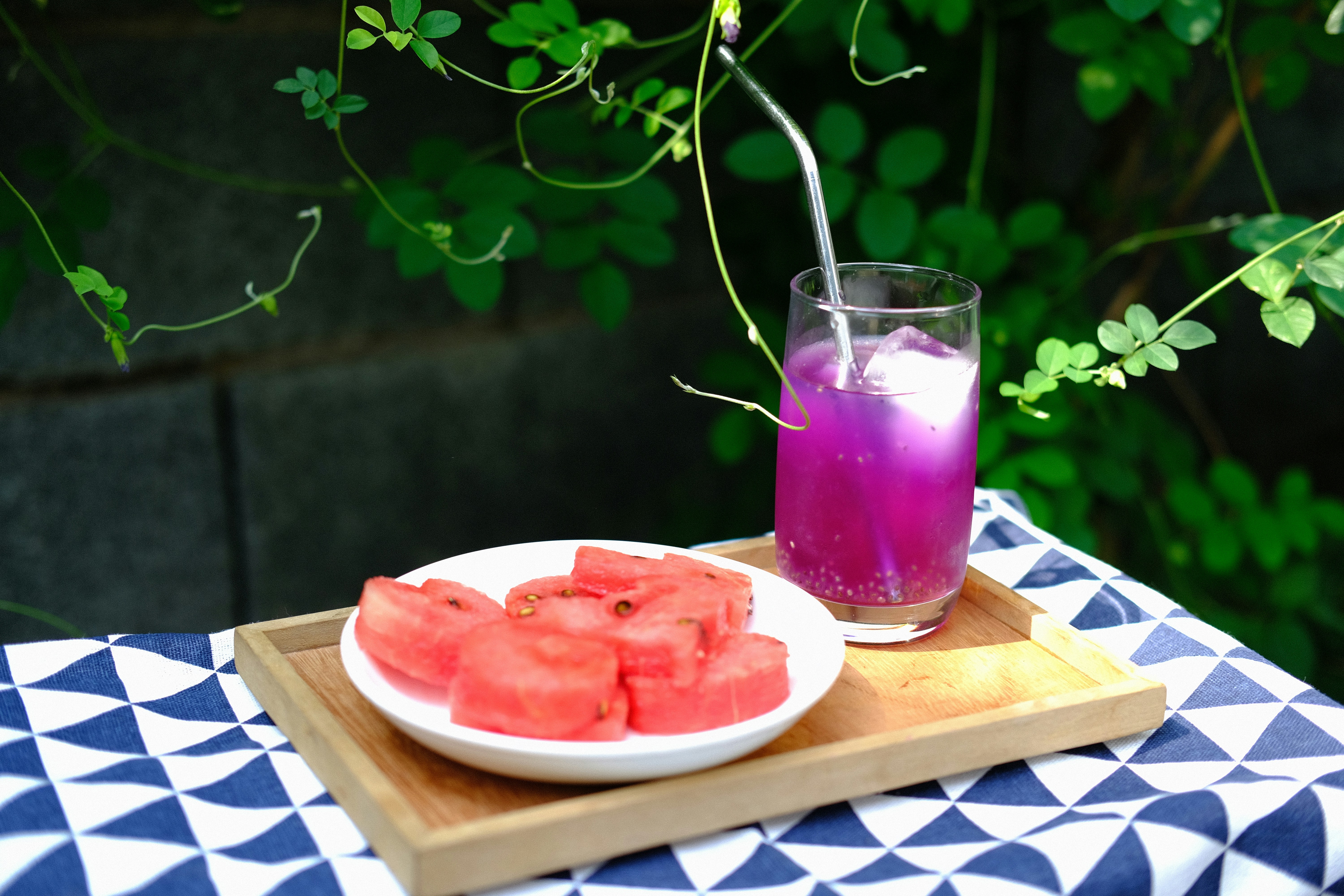 Sliced watermelon on a white plate, a hydration-rich fruit