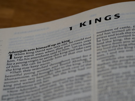 white printer paper on brown wooden table