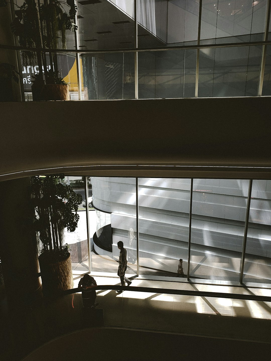 person walking on sidewalk during daytime