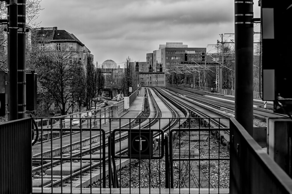 grayscale photo of city buildings