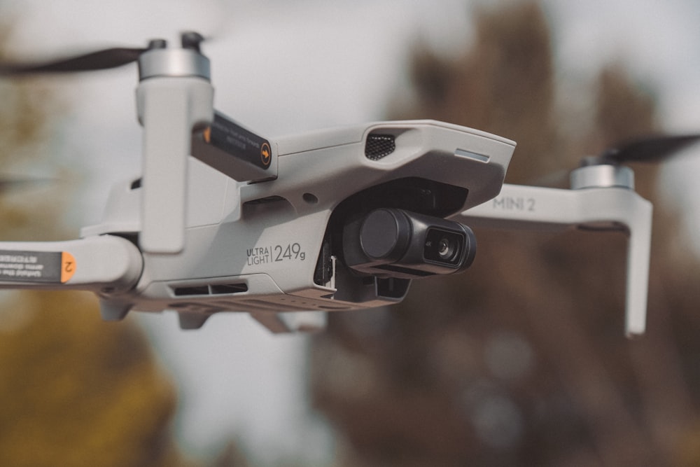 white and black drone in close up photography