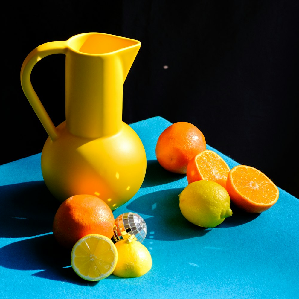 yellow fruit juice in pitcher