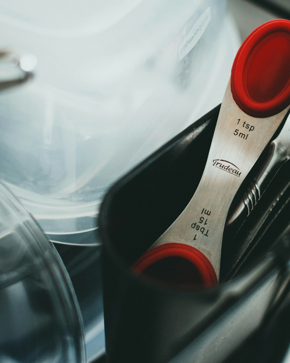 black and red plastic bottle