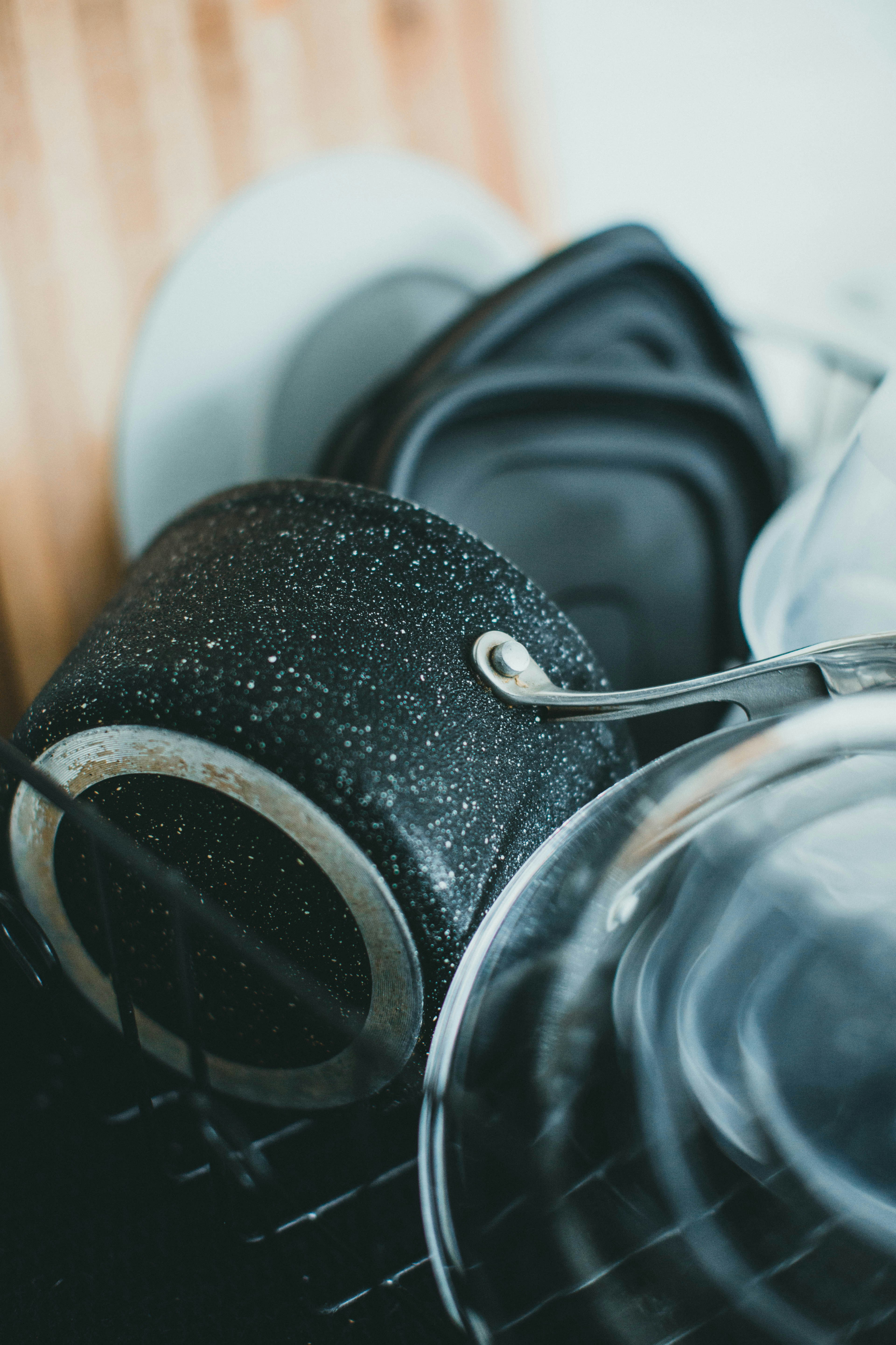 black ceramic mug on white ceramic plate