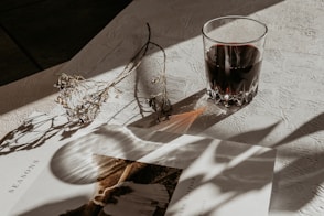 clear drinking glass on white table