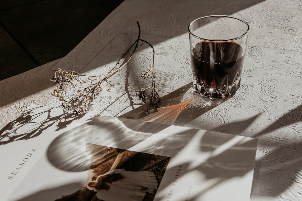 clear drinking glass on white table