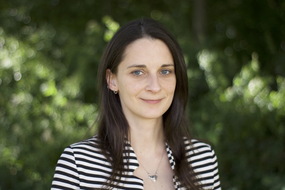 woman in black and white striped shirt