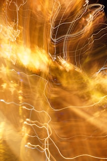 Abstract golden light trails symbolizing advanced AI and human synergy.