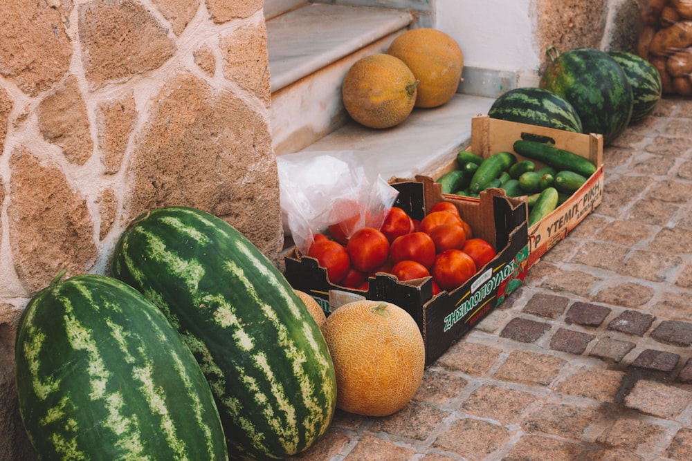 green watermelon and orange fruits